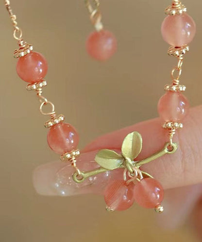 Handgefertigtes wasserrotes Overgild-Kirschperlen-Kettenarmband