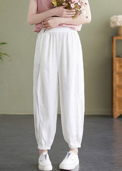 Pantalones de verano de cintura elástica blancos hechos a mano.