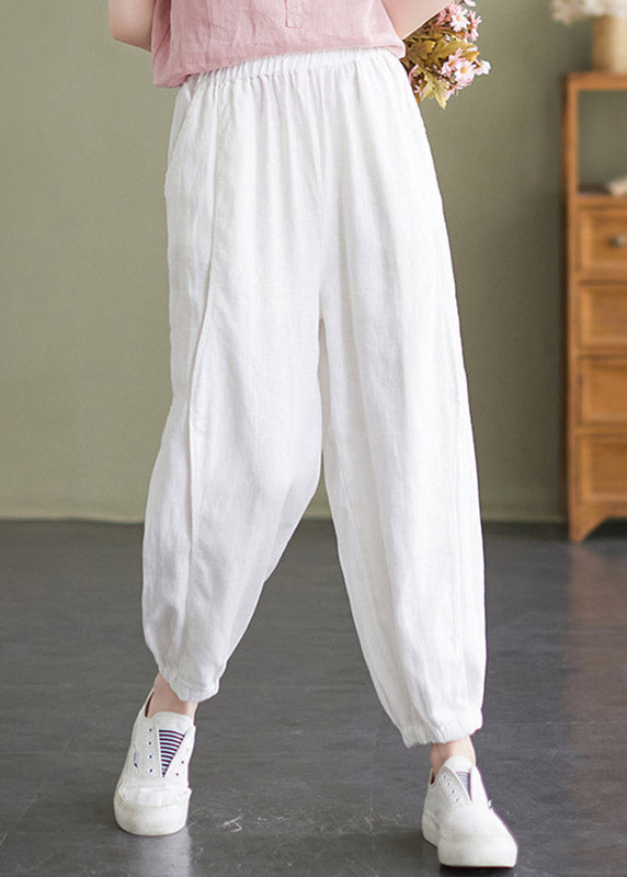 Pantalones de verano de cintura elástica blancos hechos a mano.