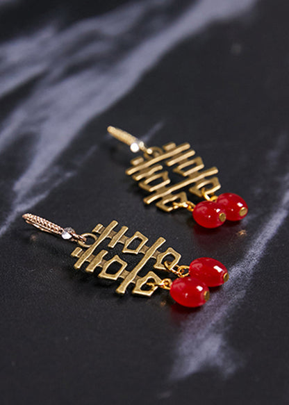 Pendientes colgantes de boda de cobre con el personaje XI hechos a mano