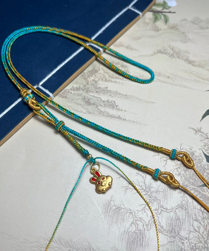 Handgemachte Gelbgold-Halskette mit Kaninchen-Anhänger aus Bienenwachs