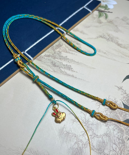 Handgemachte Gelbgold-Halskette mit Kaninchen-Anhänger aus Bienenwachs