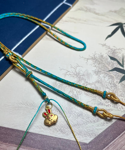 Handgemachte Gelbgold-Halskette mit Kaninchen-Anhänger aus Bienenwachs