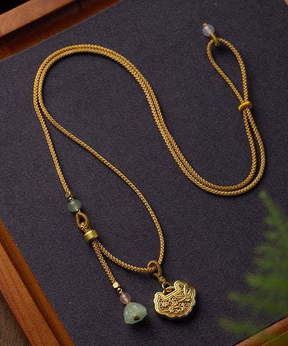 Collar con colgante de vaina de loto de ágata de jade y cobre amarillo dorado hecho a mano