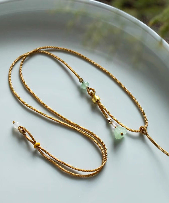 Collar con colgante de vaina de loto de ágata de jade y cobre amarillo dorado hecho a mano