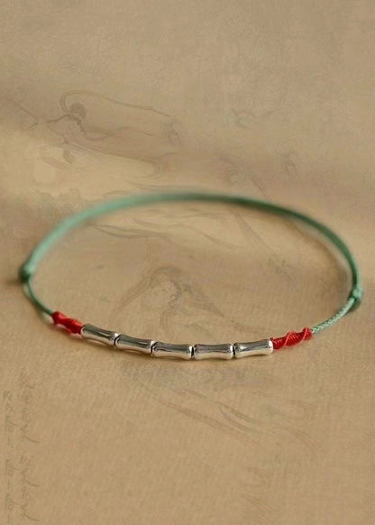 Pulsera de plata de la buena suerte con bambú tejido a mano