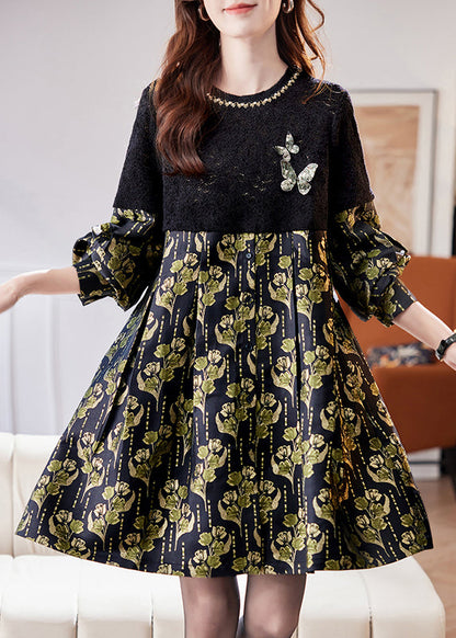 Vestido midi de primavera con lentejuelas y patchwork en negro ahuecado de Jacquard