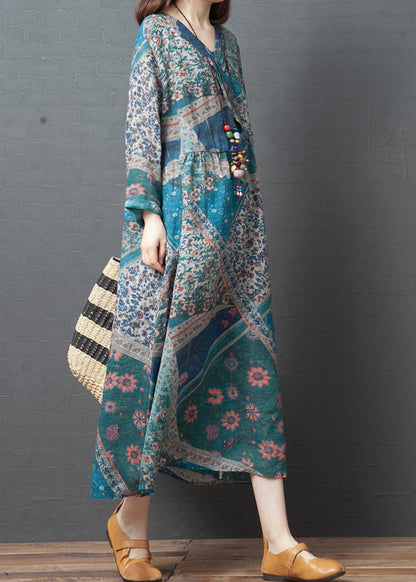 Hellblaues, bedrucktes, lockeres, langes Leinenkleid mit langen Ärmeln