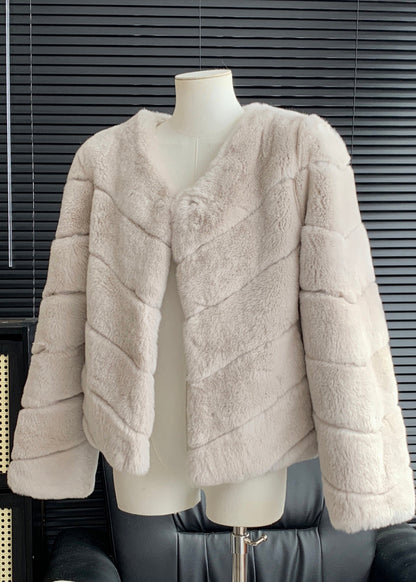 Abrigos de piel y cuero de conejo azul claro para invierno