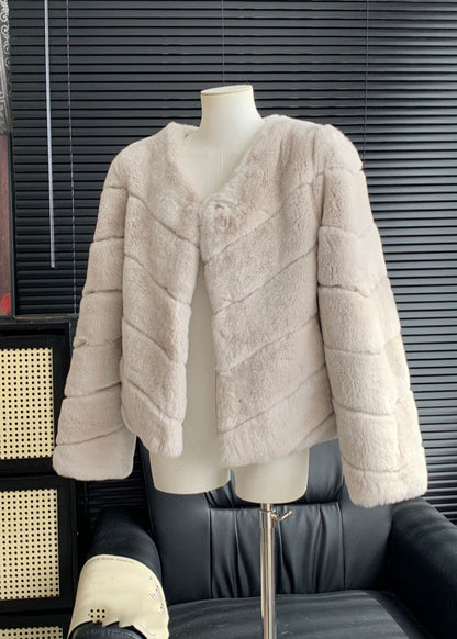 Abrigos de piel y cuero de conejo azul claro para invierno