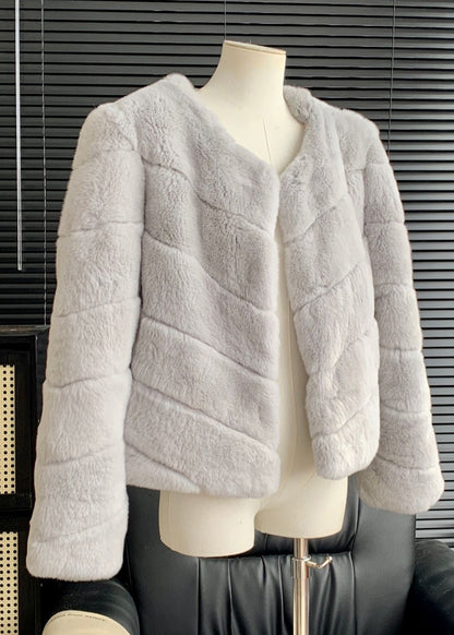 Abrigos de piel y cuero de conejo azul claro para invierno