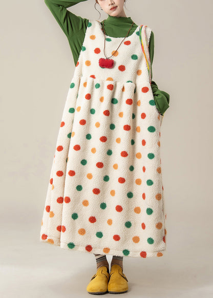 Ärmelloses, locker sitzendes Kleid mit aprikosenfarbenem Punktmuster, Taschen und Kunstpelz, ärmellos