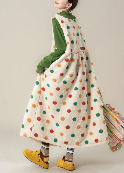 Ärmelloses, locker sitzendes Kleid mit aprikosenfarbenem Punktmuster, Taschen und Kunstpelz, ärmellos