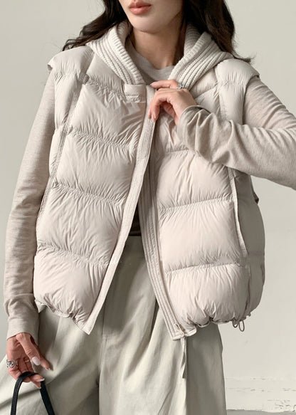 Chaleco holgado de plumón de pato con capucha y cordón ajustable de color albaricoque para invierno