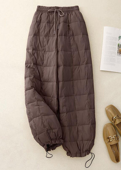 Lockere beige karierte Winterhose mit Kordelzug, elastischem Bund und feiner Baumwollfüllung