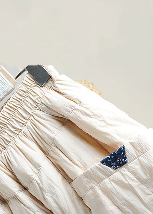 Pantalones holgados de algodón con cintura elástica y bolsillos beige para invierno