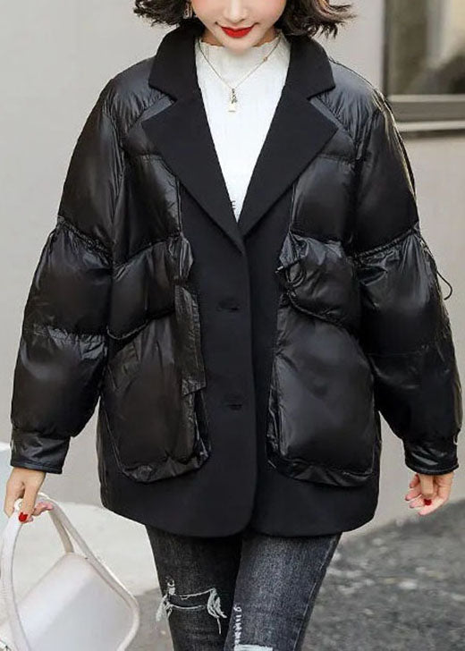 Lockerer schwarzer Wintermantel mit Patchwork-Taschen und Kordelzug