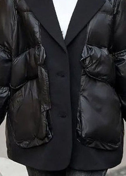 Lockerer schwarzer Wintermantel mit Patchwork-Taschen und Kordelzug