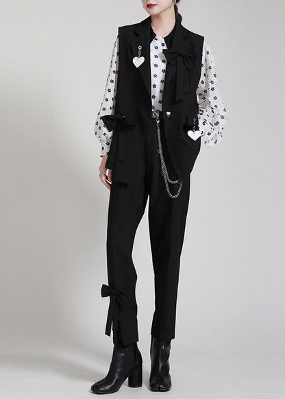 Lockere schwarze PeterPan-Kragen-Knopfschleife, ärmellose Weste