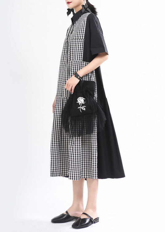Lockeres schwarzes kariertes Patchwork-Knopf-Herbstkleid mit halben Ärmeln