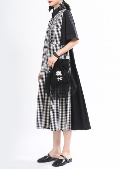 Lockeres schwarzes kariertes Patchwork-Knopf-Herbstkleid mit halben Ärmeln