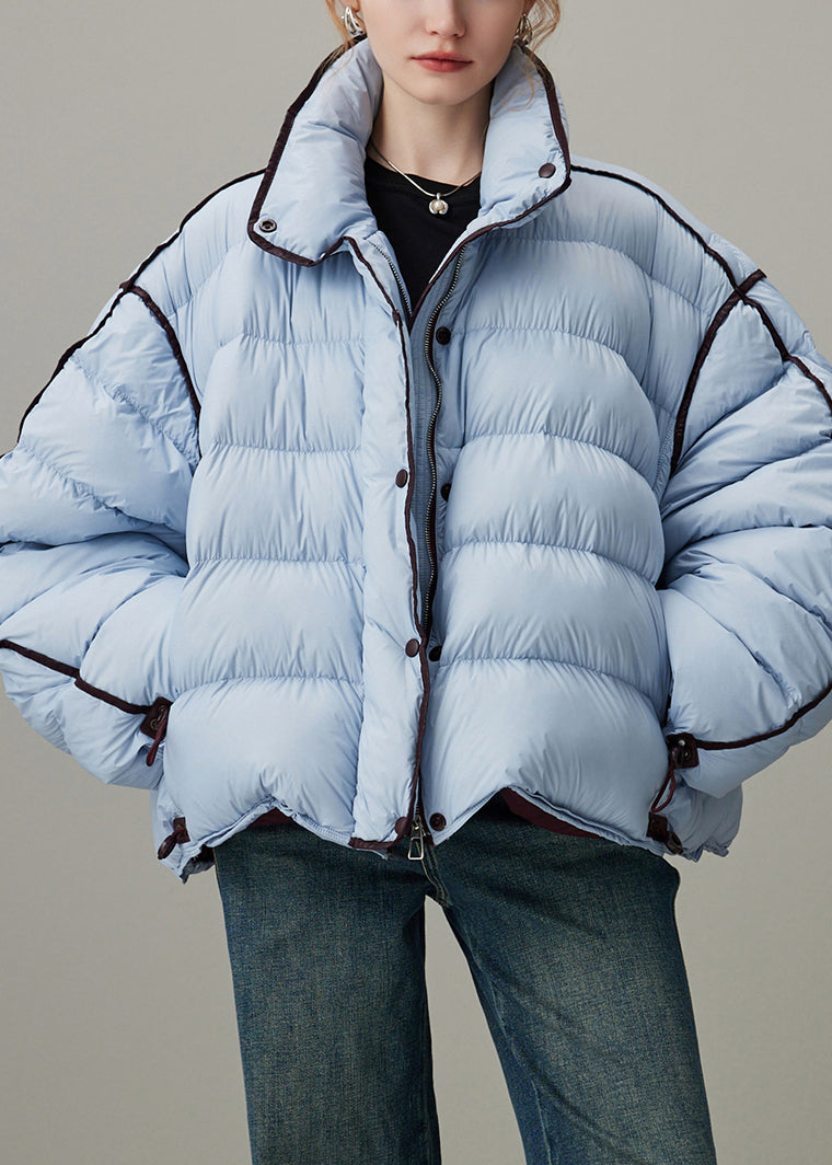 Abrigo acolchado de plumón de pato azul holgado con cuello alto, cremallera y cordón ajustable para invierno