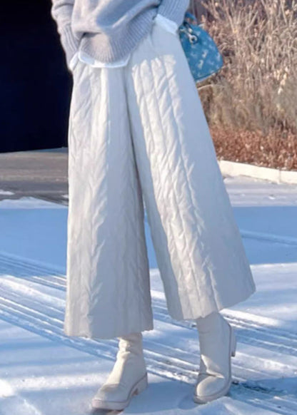 Pantalones anchos de algodón grueso con cintura elástica y bolsillos color caqui para invierno