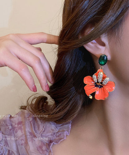 Pendientes sueltos con flor de circonita de cobre y naranja