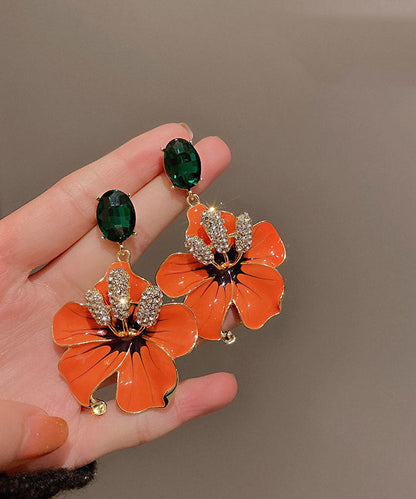 Pendientes sueltos con flor de circonita de cobre y naranja