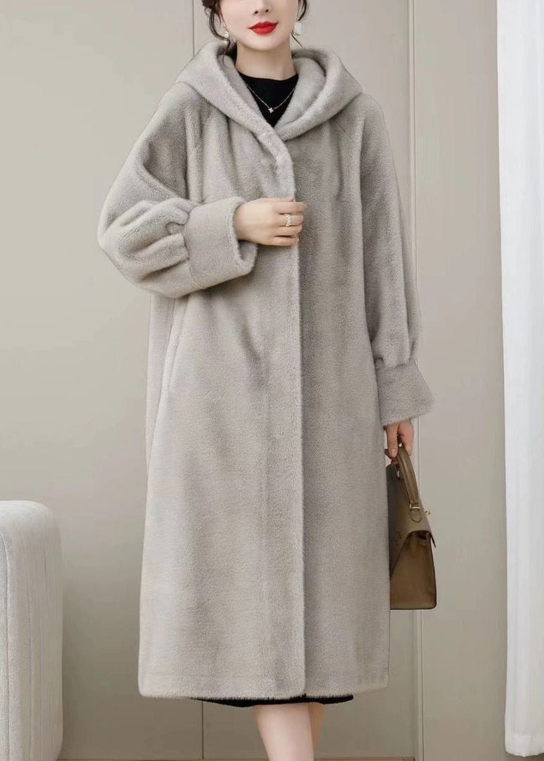 Locker geschnittene, lila Wintermäntel aus einfarbigem Nerzhaar mit Kapuze und Taschen