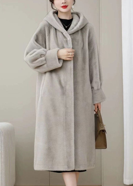 Locker geschnittene, lila Wintermäntel aus einfarbigem Nerzhaar mit Kapuze und Taschen