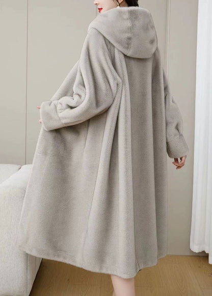 Locker geschnittene, lila Wintermäntel aus einfarbigem Nerzhaar mit Kapuze und Taschen