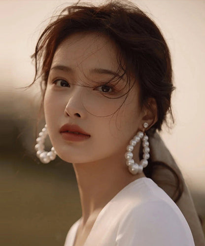 Pendientes de gota de agua con perla blanca suelta