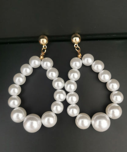Pendientes de gota de agua con perla blanca suelta