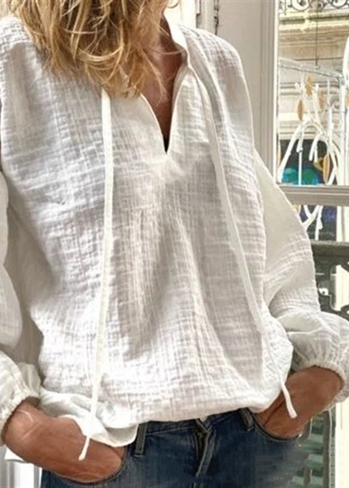 Lockere weiße Blusen mit V-Ausschnitt und Schnürung aus festem Leinen mit langen Ärmeln