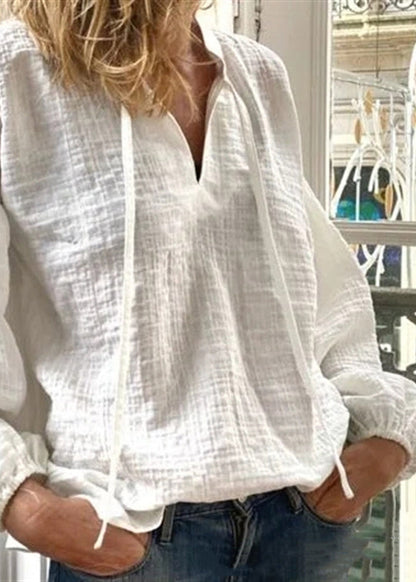 Lockere weiße Blusen mit V-Ausschnitt und Schnürung aus festem Leinen mit langen Ärmeln