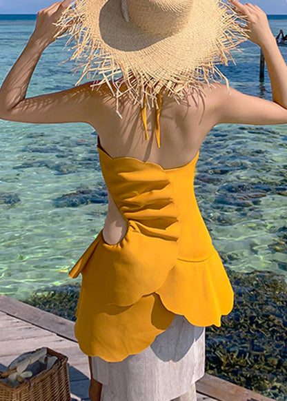 Luxuriöser gelber Rüschen-Body mit Cut-Outs