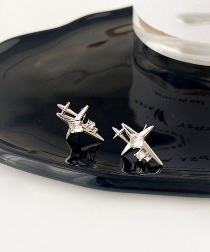 Pendientes de seda con estrellas de circonita y cobre para hombre