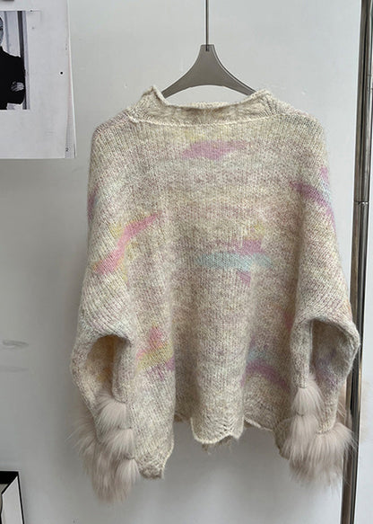 Gemütliche Strickjacke aus Baumwolle in Milchtee-Farben mit Patchwork-Design und langen Ärmeln