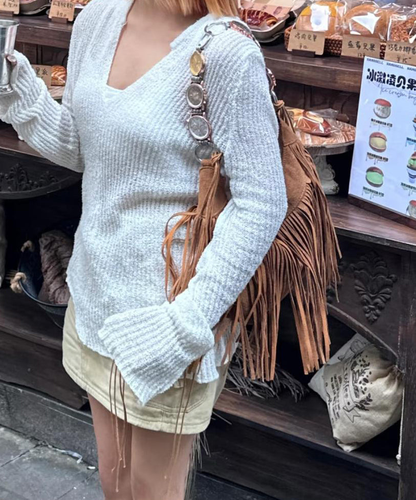 Moderne braune Wildleder-Quasten-Schultertasche