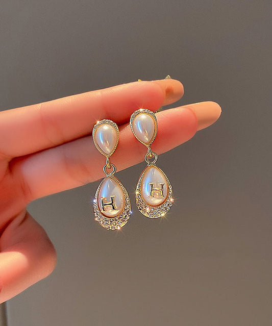 Pendientes modernos de aleación de oro con diseño de circón y perla en forma de gota de agua