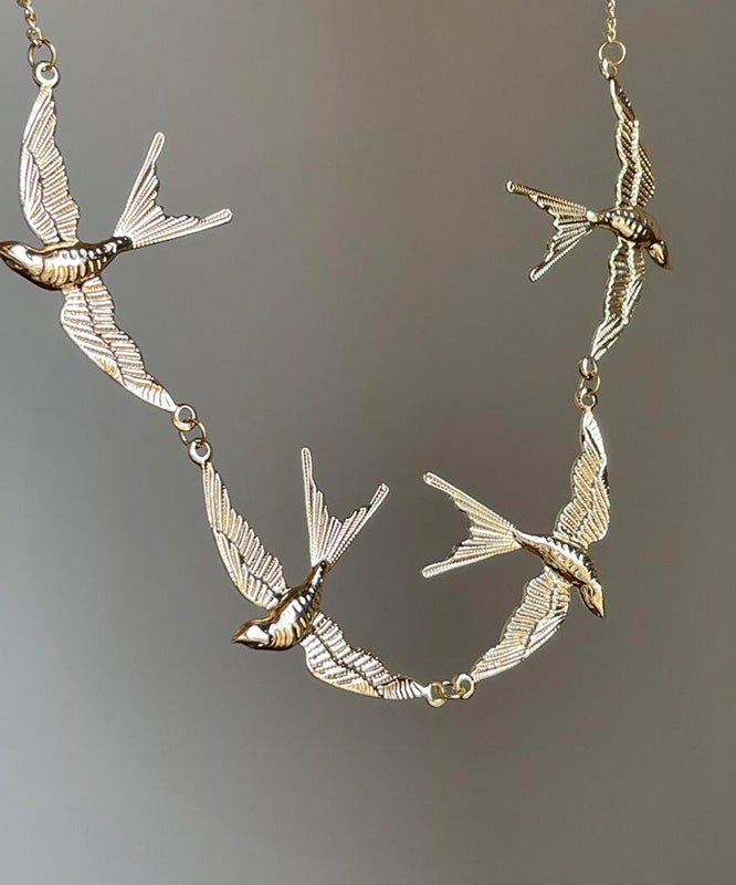 Collar moderno con colgante de golondrina pequeña de aleación de cobre y oro