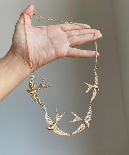 Collar moderno con colgante de golondrina pequeña de aleación de cobre y oro