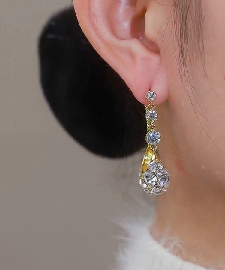 Pendientes de aro modernos con circonitas doradas y cobre