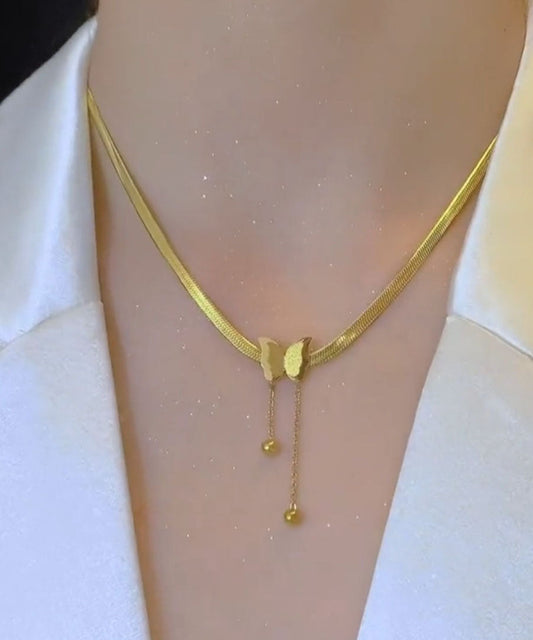 Moderne Halskette mit Schmetterlings-Quastenanhänger aus goldenem Edelstahl