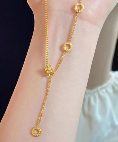 Moderne Halskette mit vergoldetem Quastenanhänger aus Edelstahl in Gold