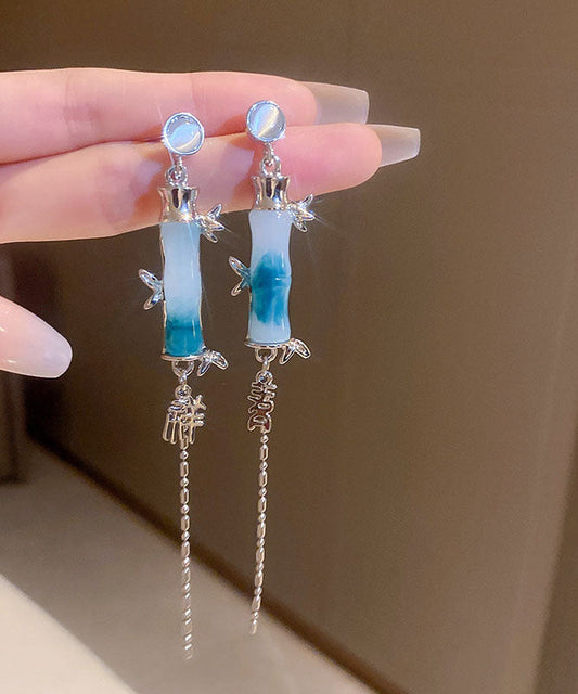 Moderne grüne Ohrringe mit Quaste aus Acryl und Bambus