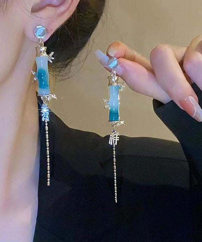 Moderne grüne Ohrringe mit Quaste aus Acryl und Bambus