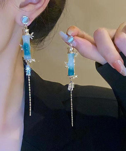 Moderne grüne Ohrringe mit Quaste aus Acryl und Bambus