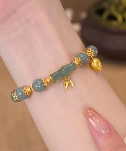 Pulsera moderna de jade y bambú con dorado verde y gris